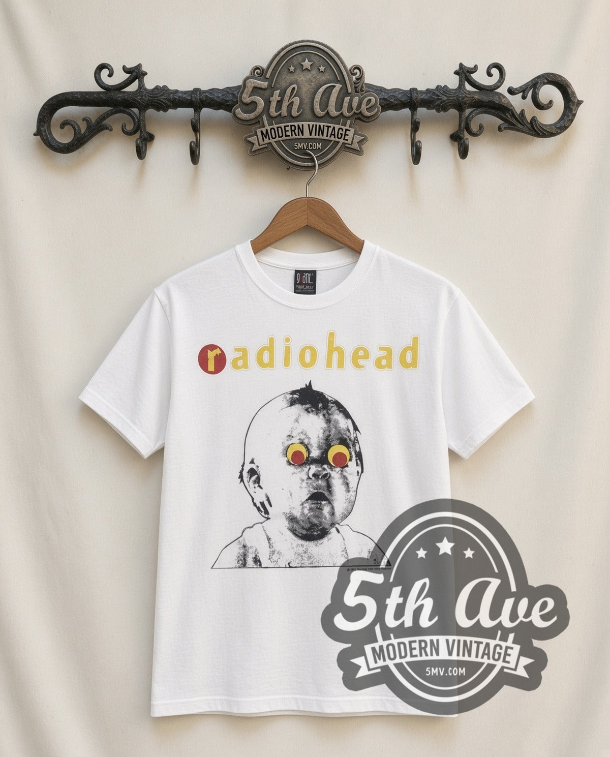 Radiohead Pablo Honey vintage band t-shirt in white, front view on a display rack