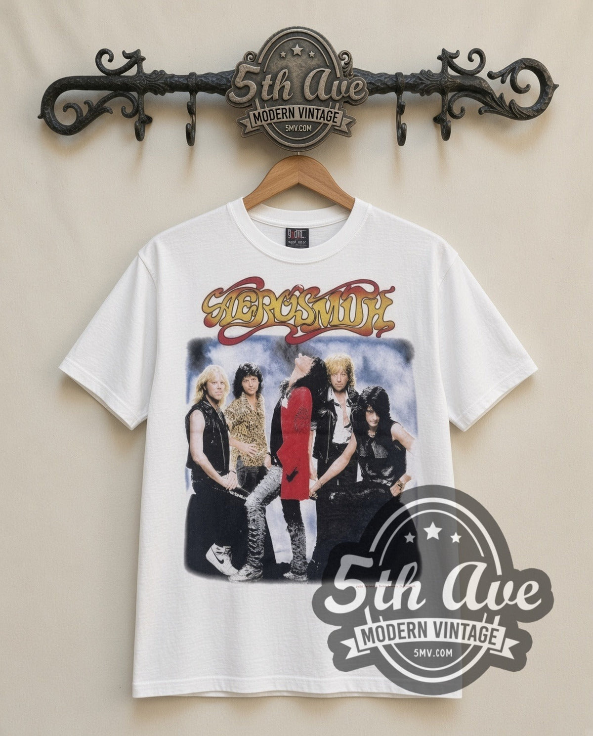 Aerosmith Band Photo vintage band t-shirt in white, front view on a display rack