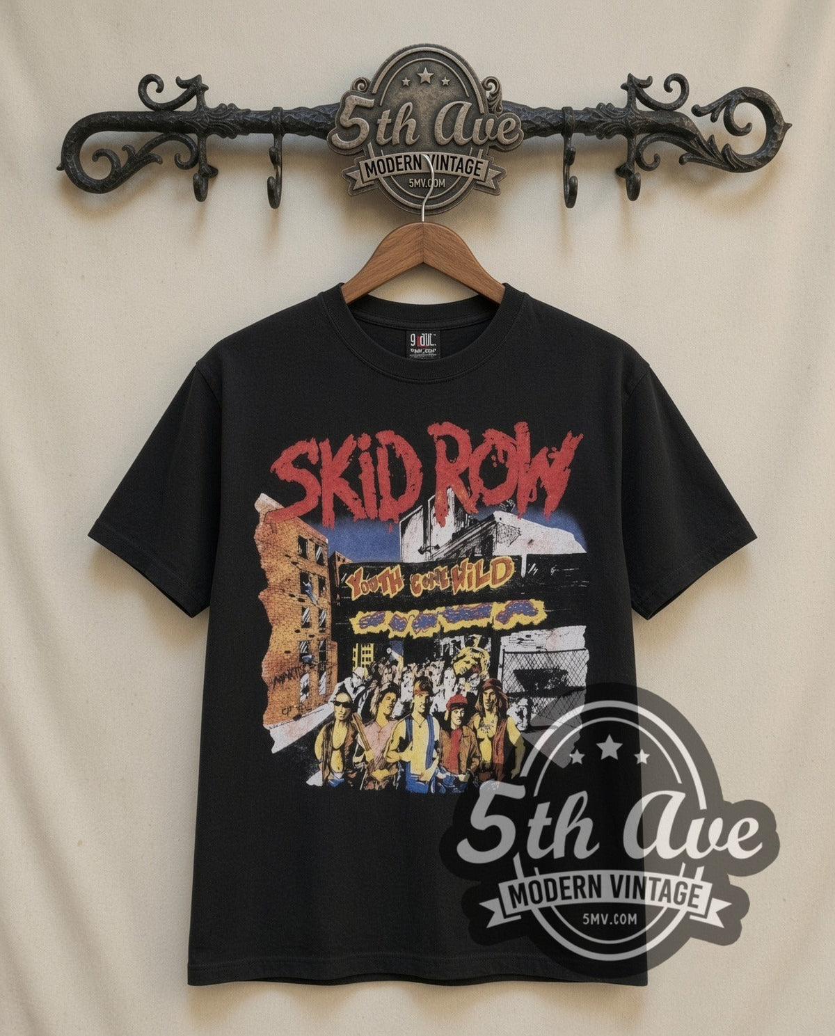 Skid Row Youth Gone Wild vintage band t-shirt in black, front view on a display rack