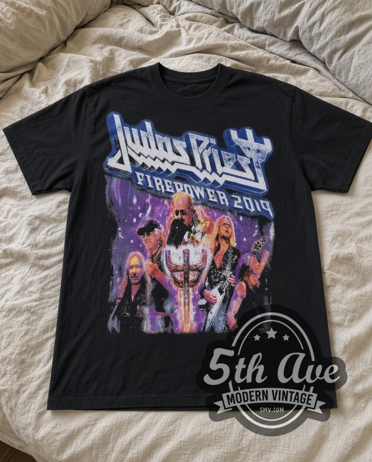 Judas Priest Firepower 2018 vintage band t-shirt in black laid flat on a bed, front artwork