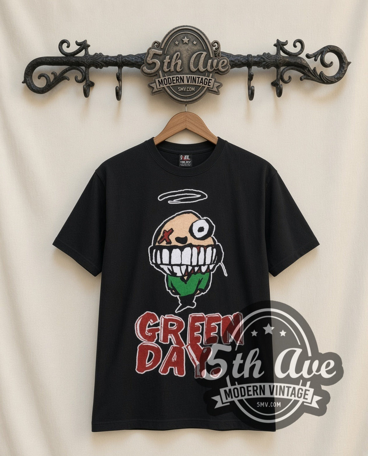 Green Day Smiley vintage band t-shirt in black, front view on the 5MV rack