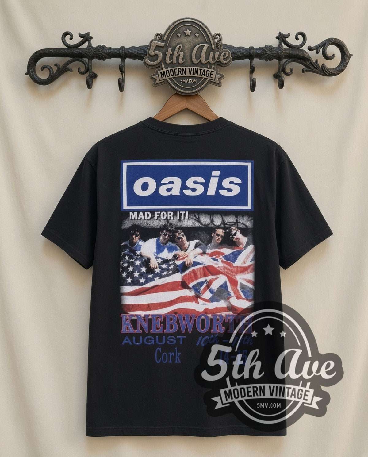 Oasis Street vintage band t-shirt in black, back view on a display rack