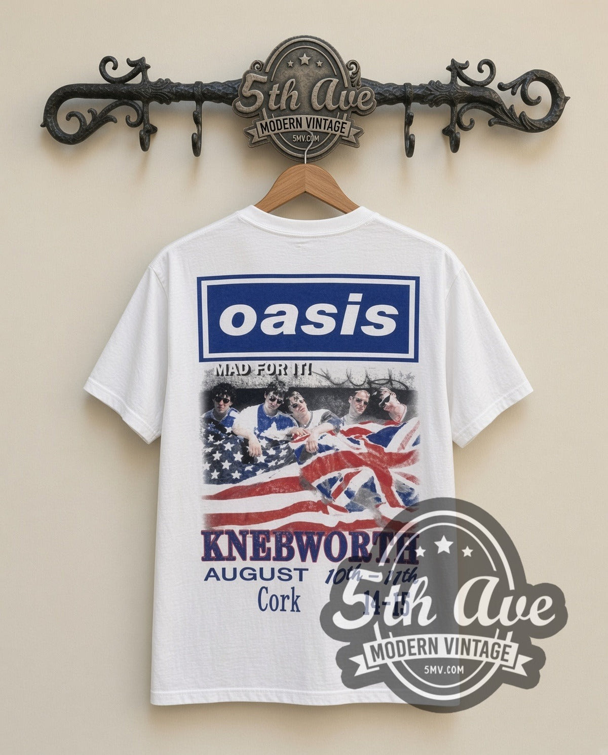 Oasis Street vintage band t-shirt in white, back view on a display rack