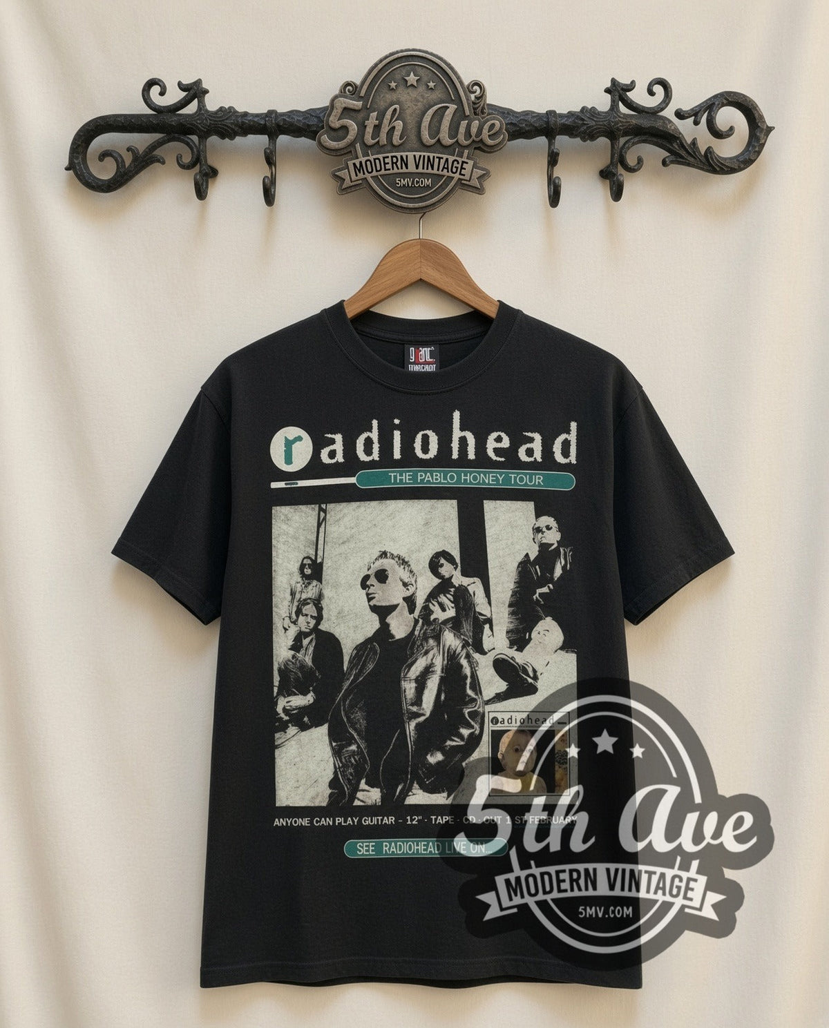 Radiohead Pablo Honey Tour vintage band t-shirt in black, front view on a display rack