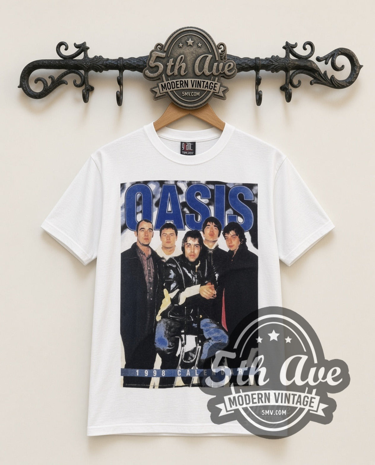 Oasis Tour Calendar vintage band t-shirt in white, front view on a display rack