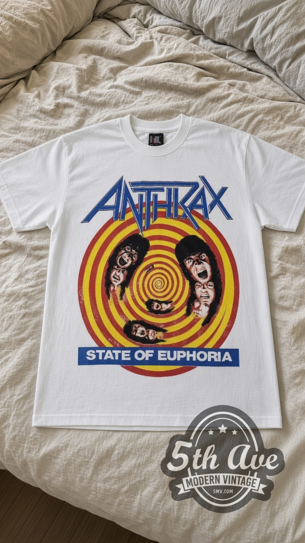 Anthrax State of Euphoria vintage band t-shirt in white laid flat on a bed, front artwork