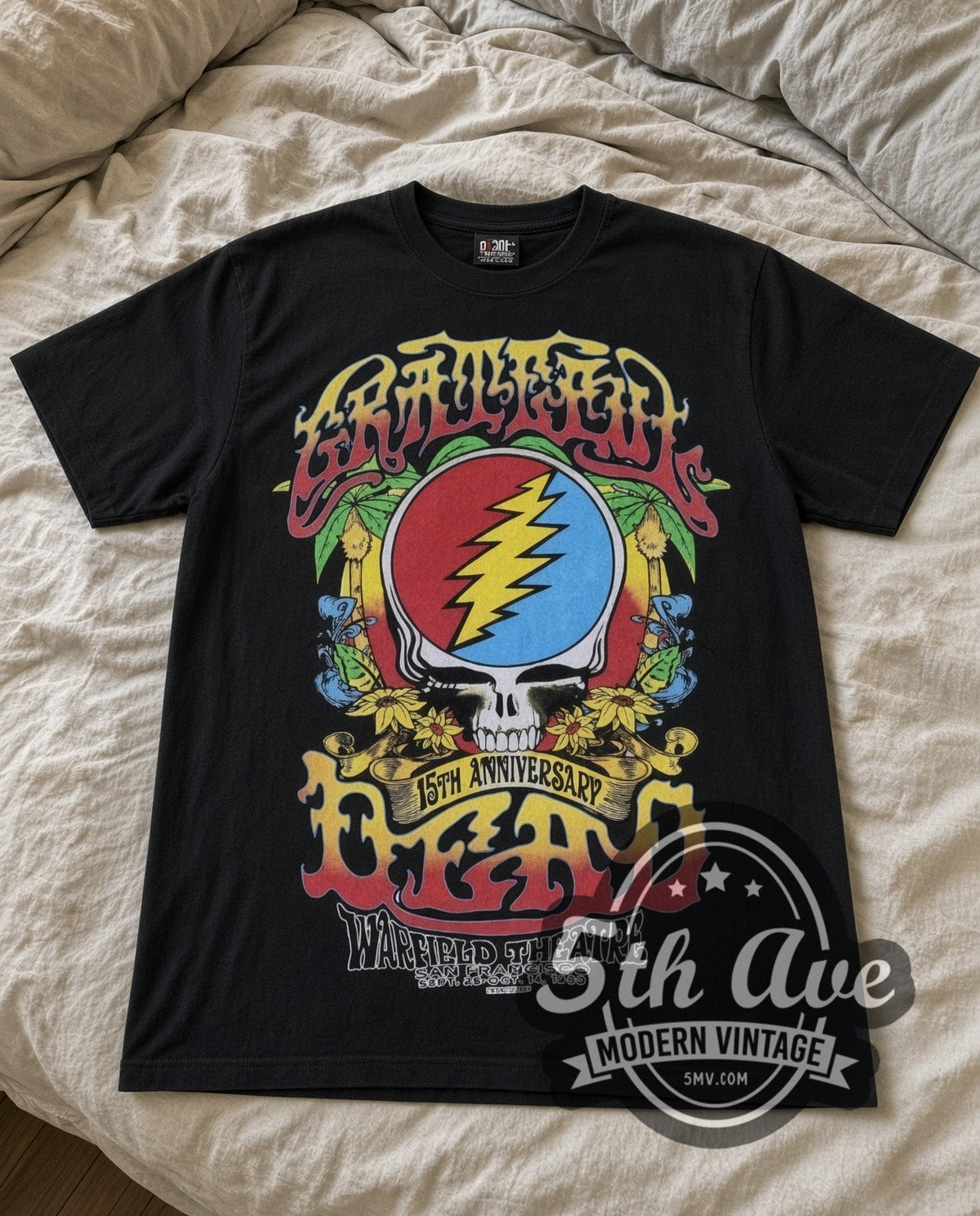 Grateful Dead 15th Anniversary Warfield vintage band tee in black laid flat
