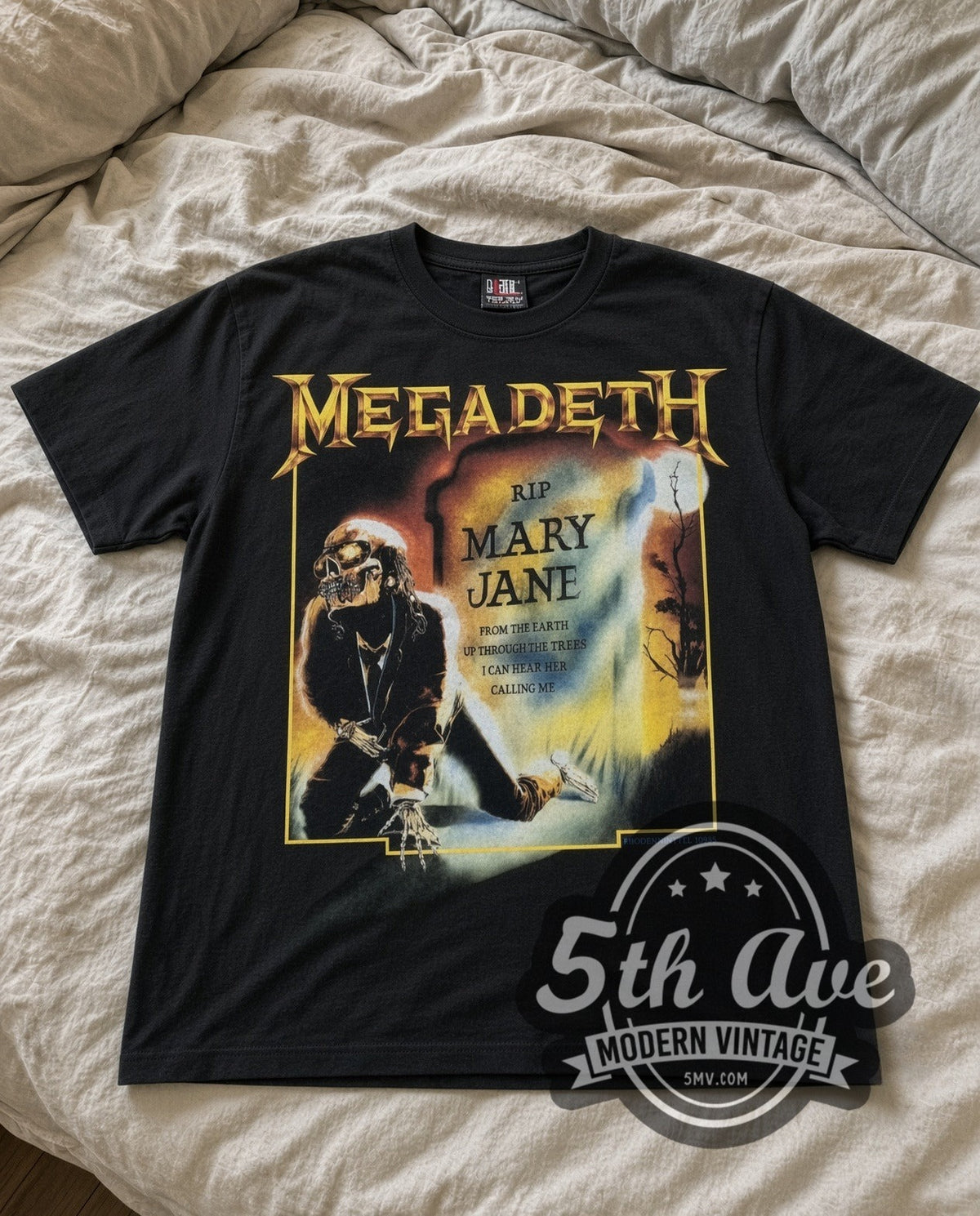Megadeth Mary Jane vintage band t-shirt in black laid flat on a bed, front artwork