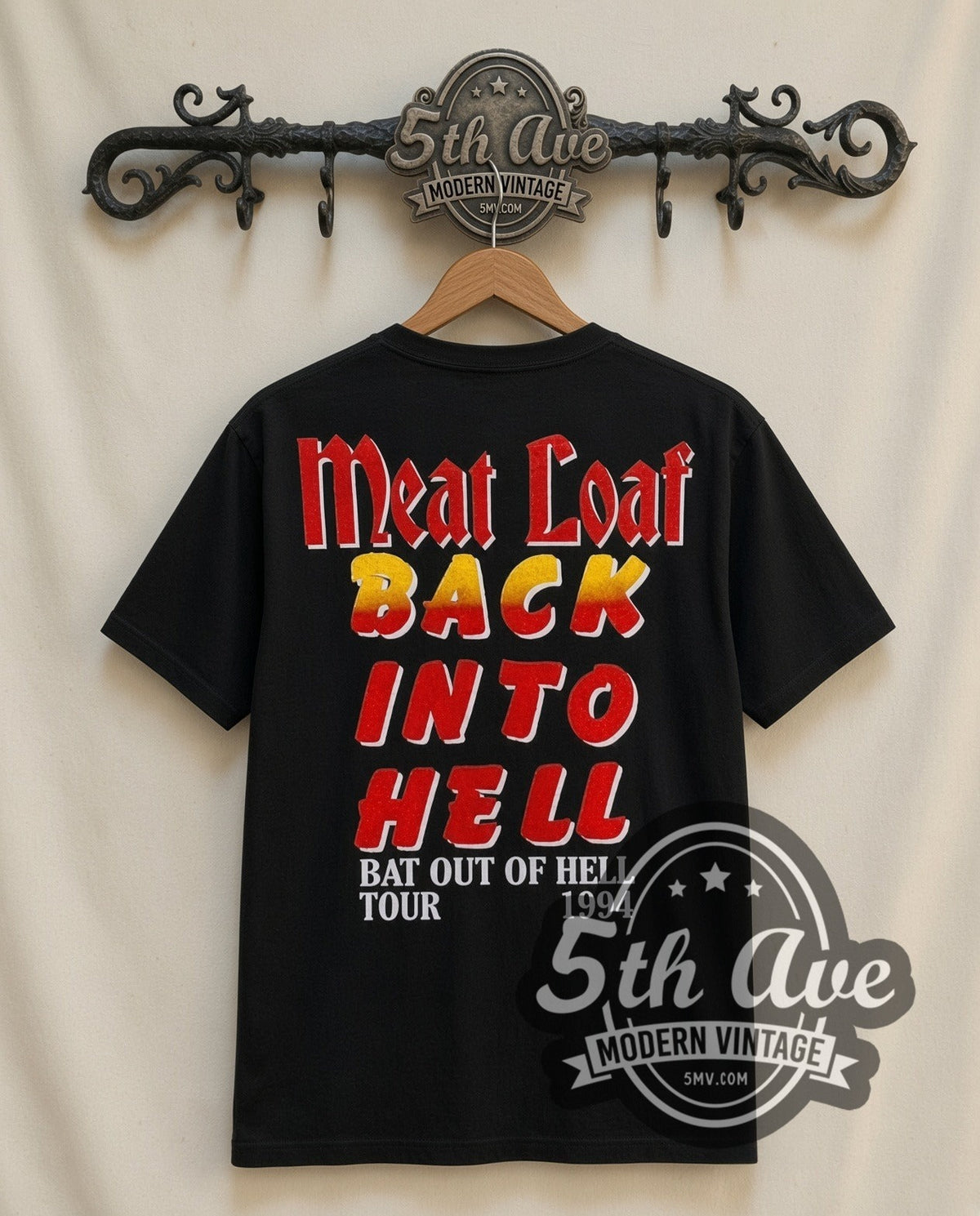 Meat Loaf Bat Out of Hell 1994 vintage band t-shirt in black, back view on a display rack