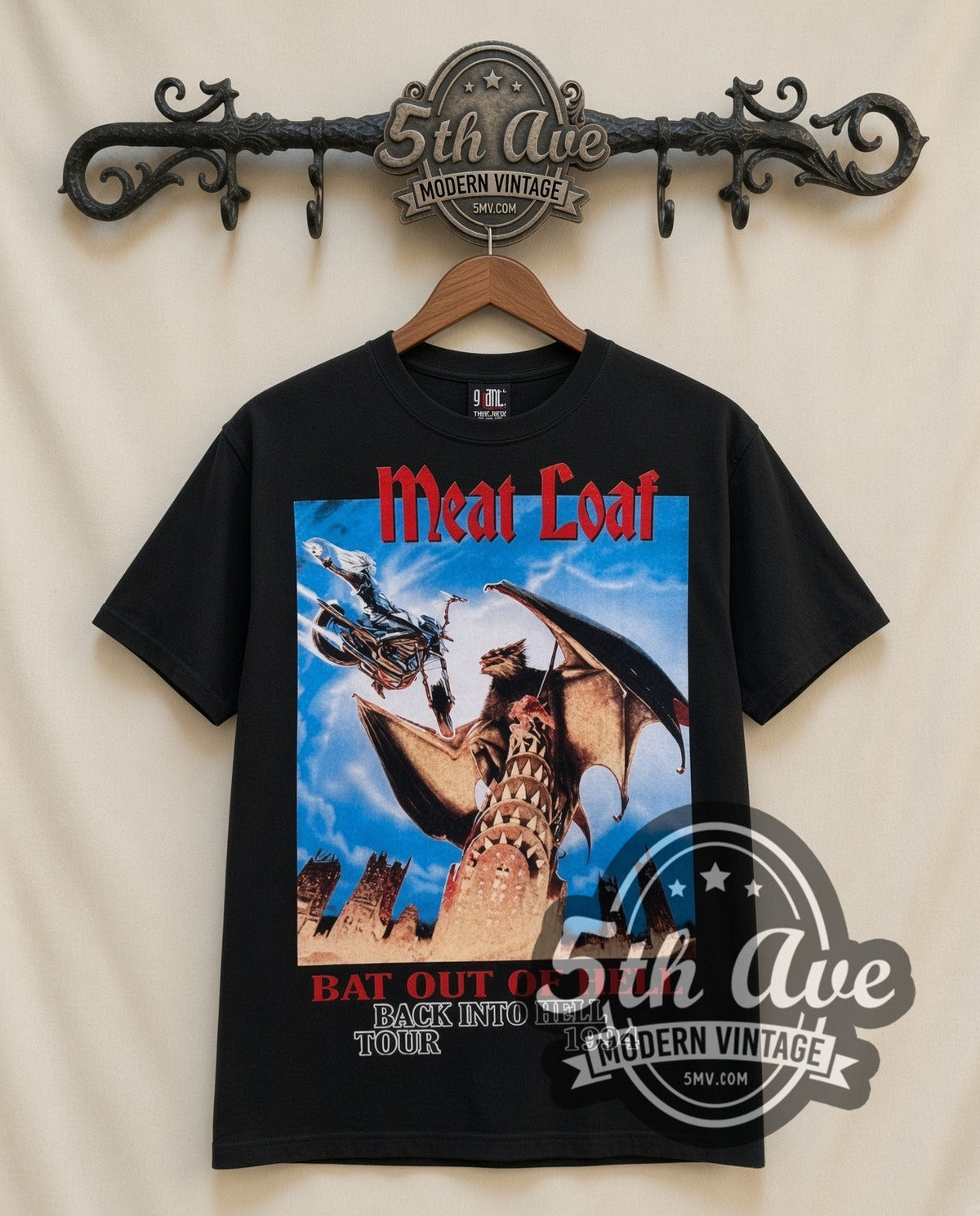 Meat Loaf Bat Out of Hell 1994 vintage band t-shirt in black, front view on a display rack