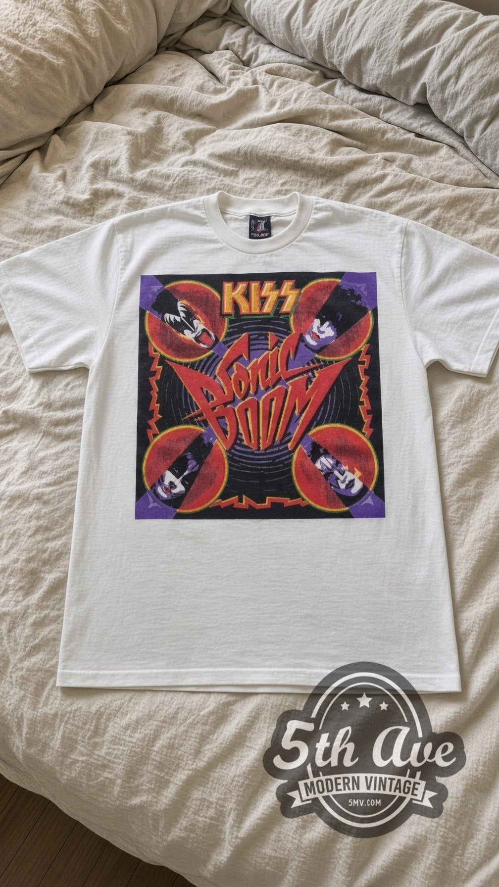 KISS Sonic Boom vintage band t-shirt laid flat on a bed, front artwork