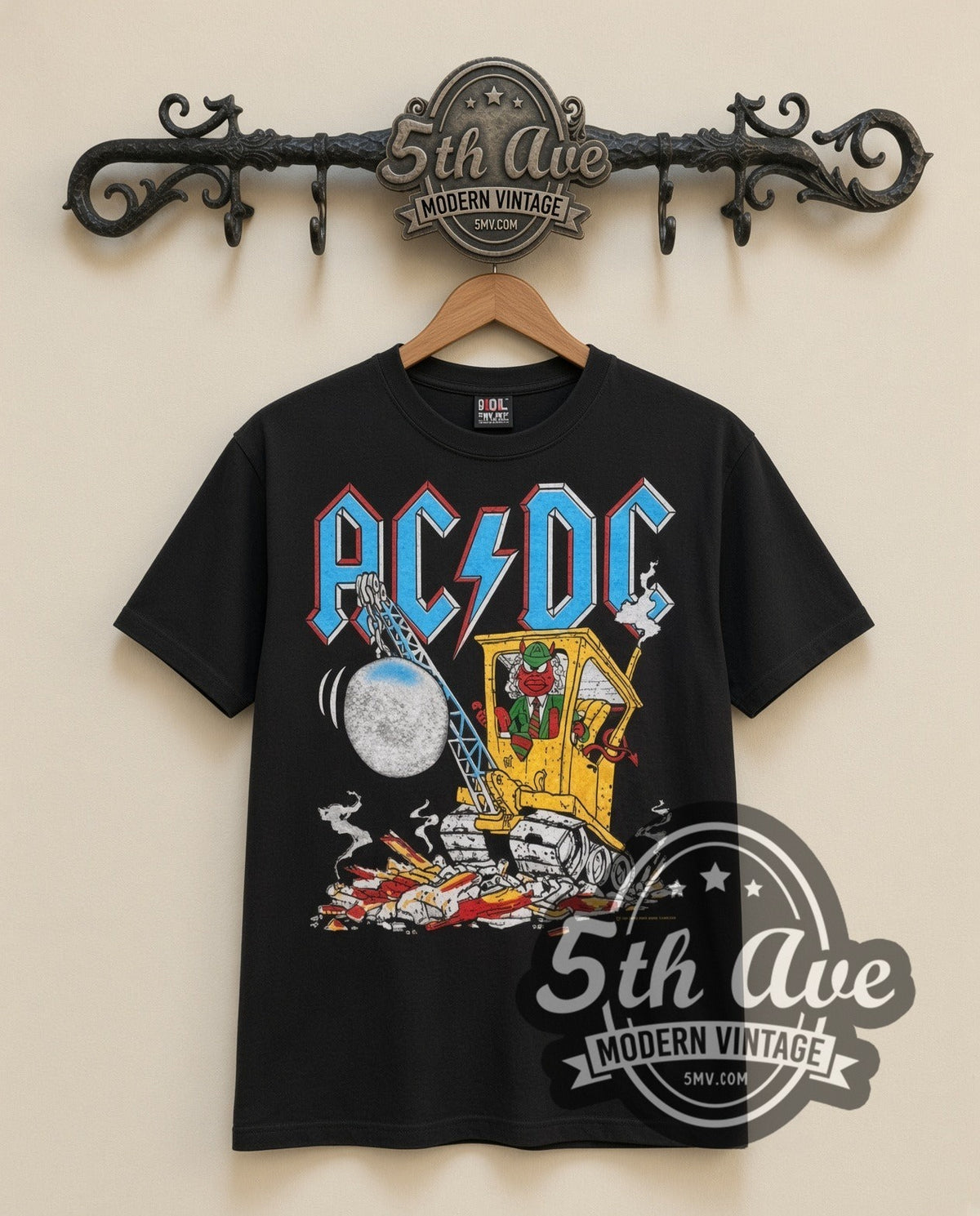 AC/DC Cannon vintage band t-shirt in black, front view on a display rack