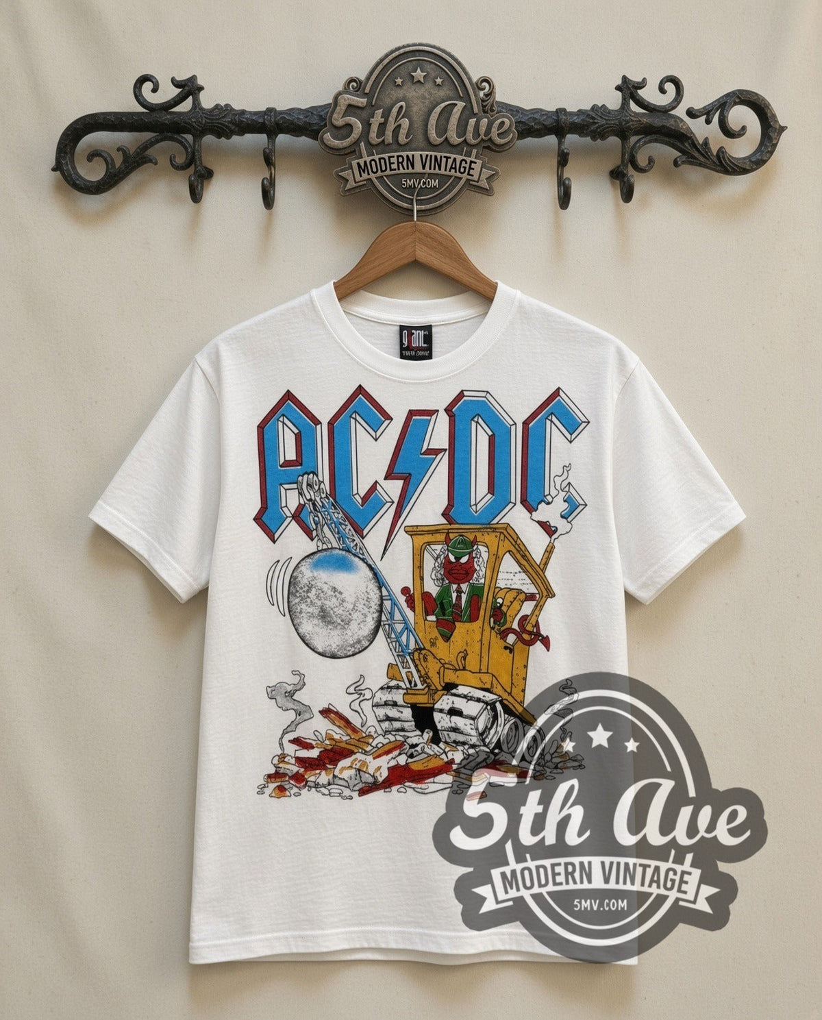 AC/DC Cannon vintage band t-shirt in white, front view on a display rack