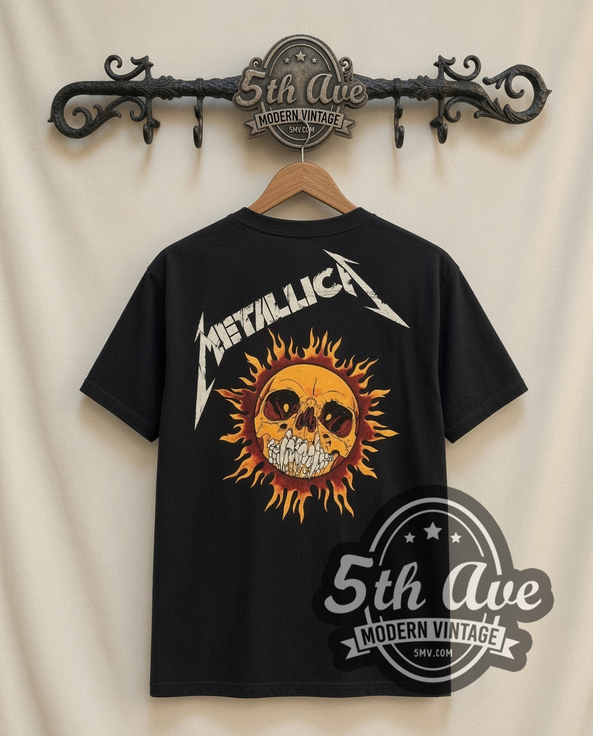 Metallica Flaming Skull vintage band t-shirt, back view on a display rack