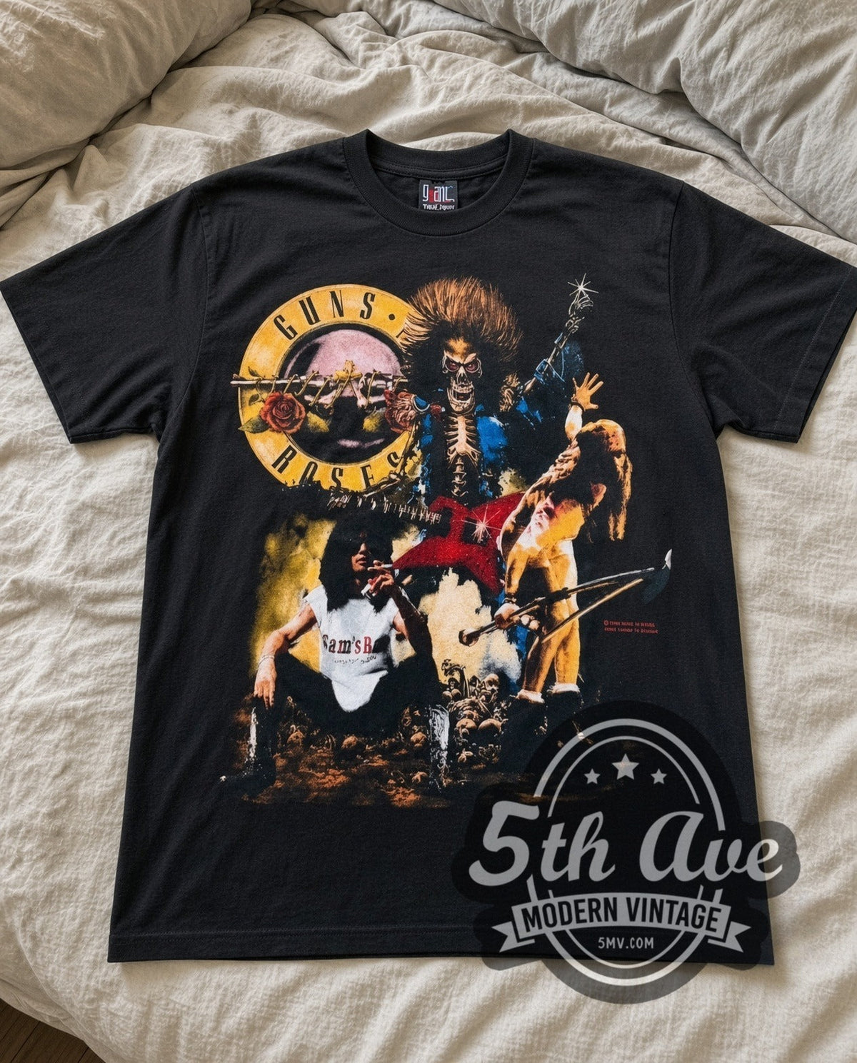 Guns N Roses Appetite Circle vintage band t-shirt in black laid flat on a bed, front artwork