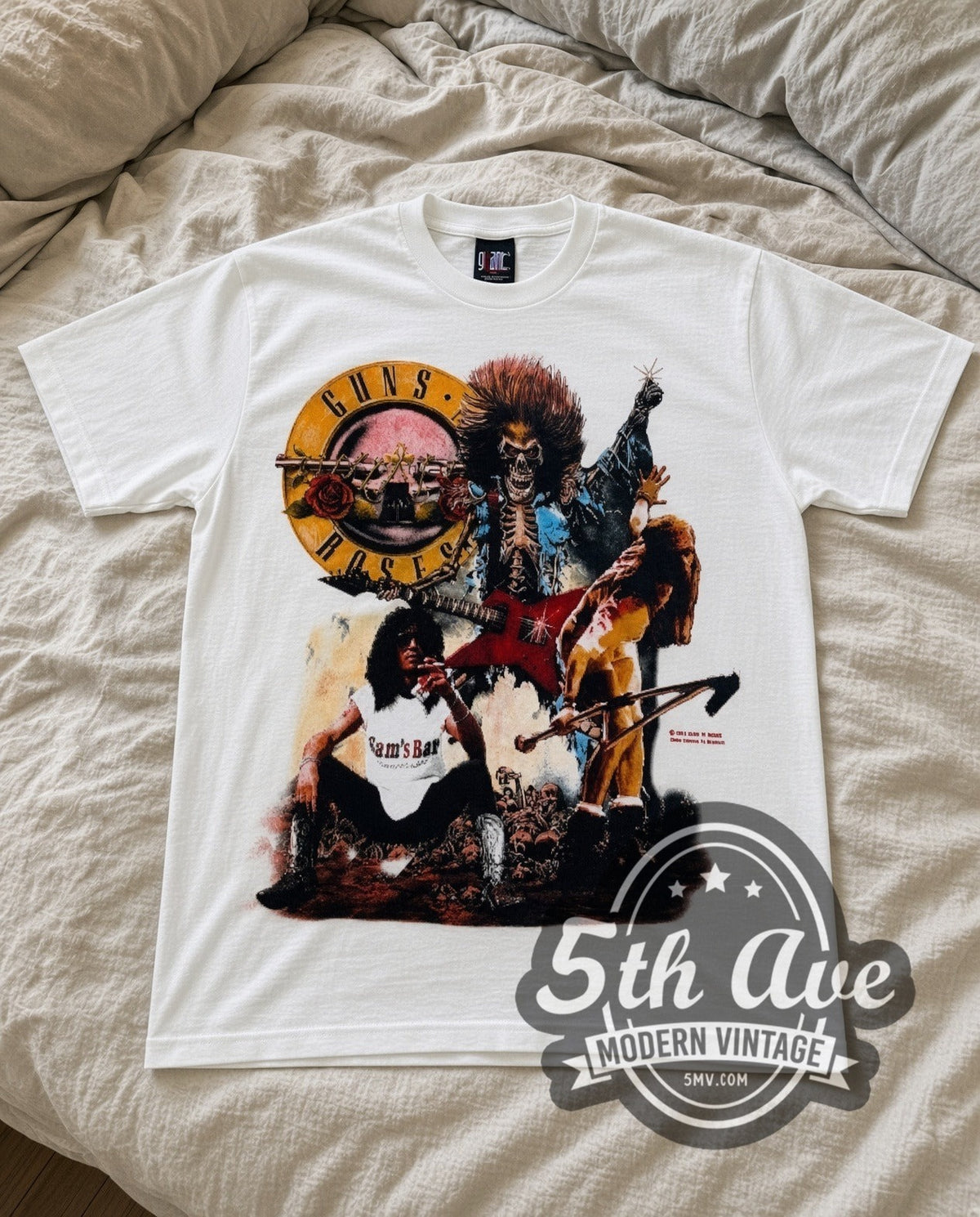 Guns N Roses Appetite Circle vintage band t-shirt in white laid flat on a bed, front artwork