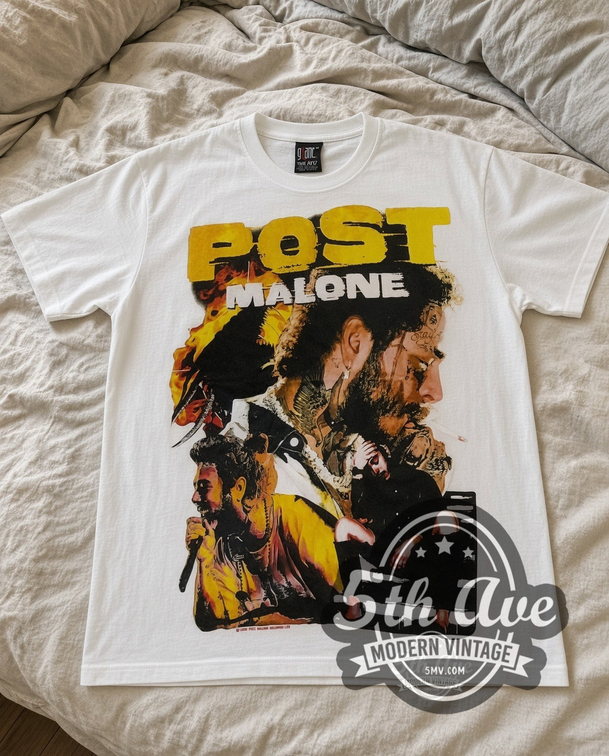 Post Malone Face Tattoos vintage rap tee in white laid flat on a bed, front artwork