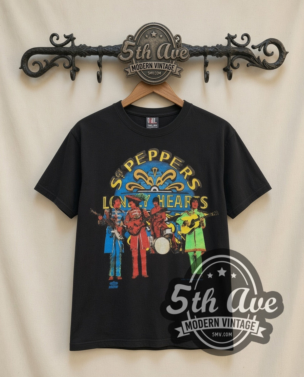 The Beatles Sgt Peppers vintage band t-shirt in black, front view on the 5MV rack