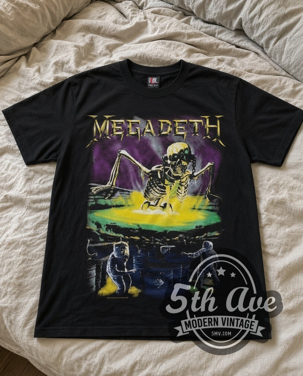 Megadeth Skeleton Stage vintage band t-shirt laid flat on a bed, front artwork