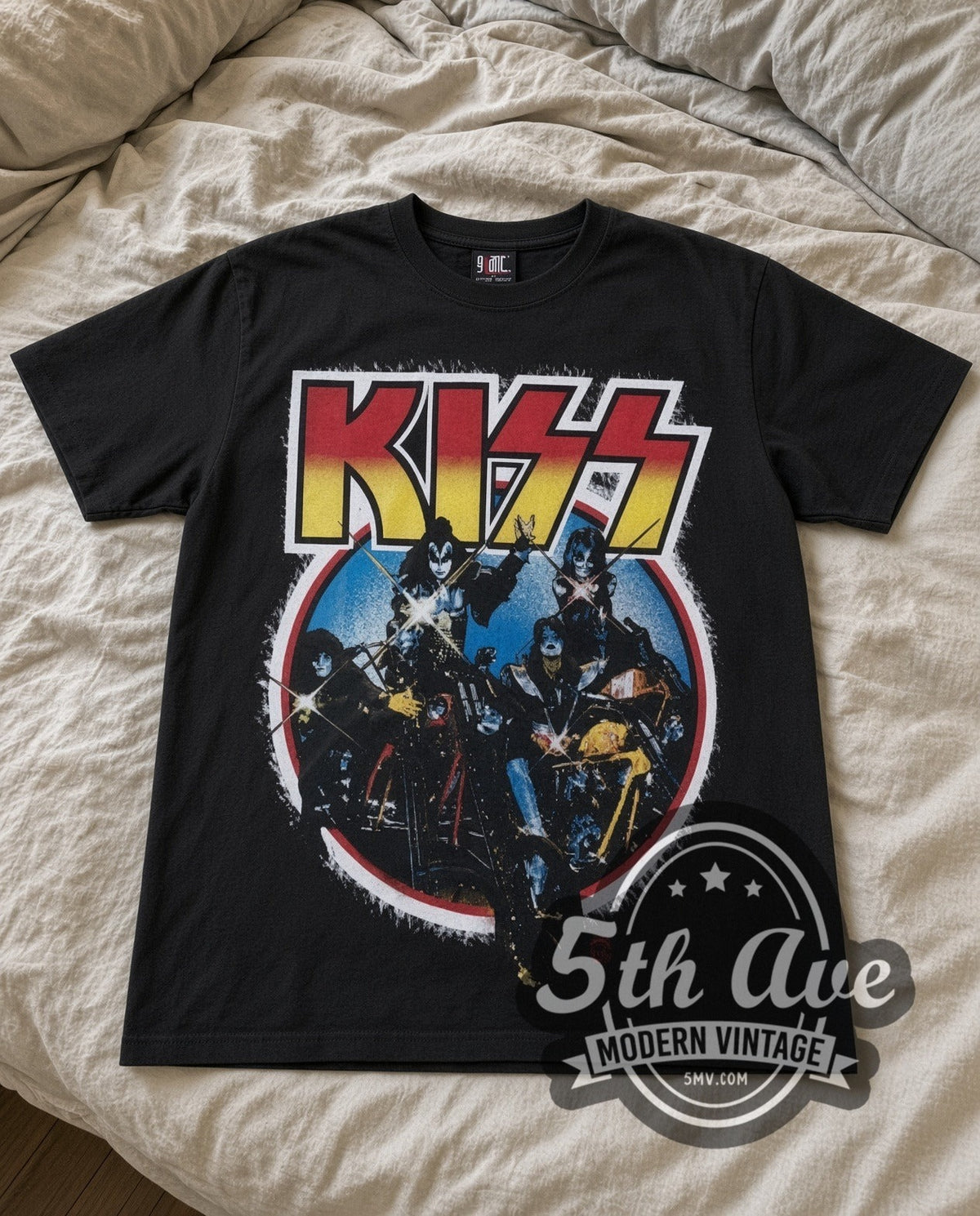 KISS Motorcycles vintage band t-shirt in black laid flat on a bed, front artwork