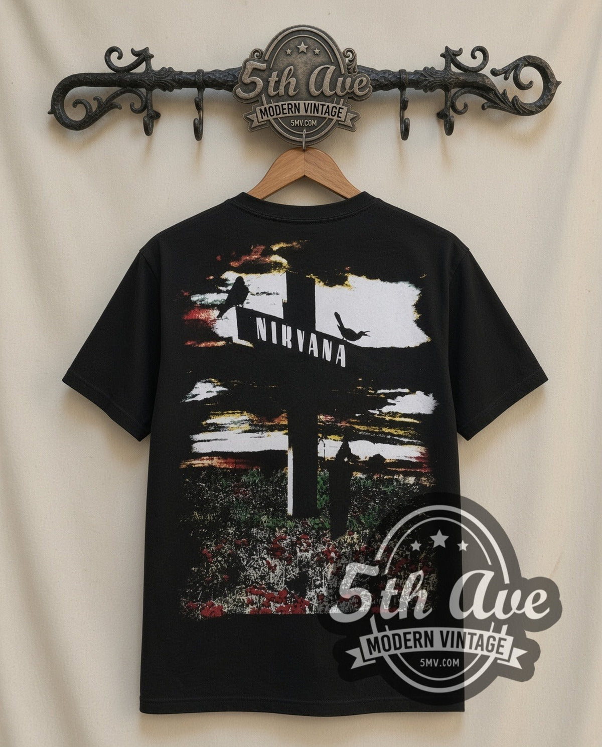 Nirvana Who Killed Kurt vintage band t-shirt in black, back view on a display rack