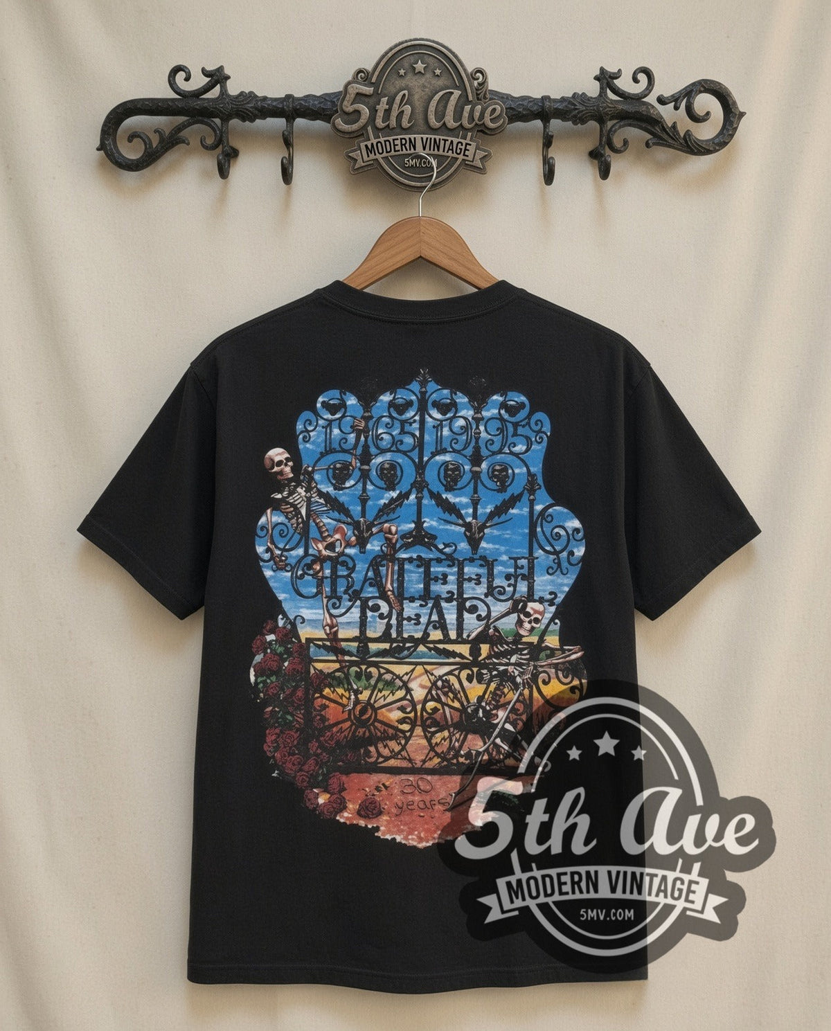 Grateful Dead Skeleton & Roses 30 Years vintage band t-shirt in black, back view on a display rack