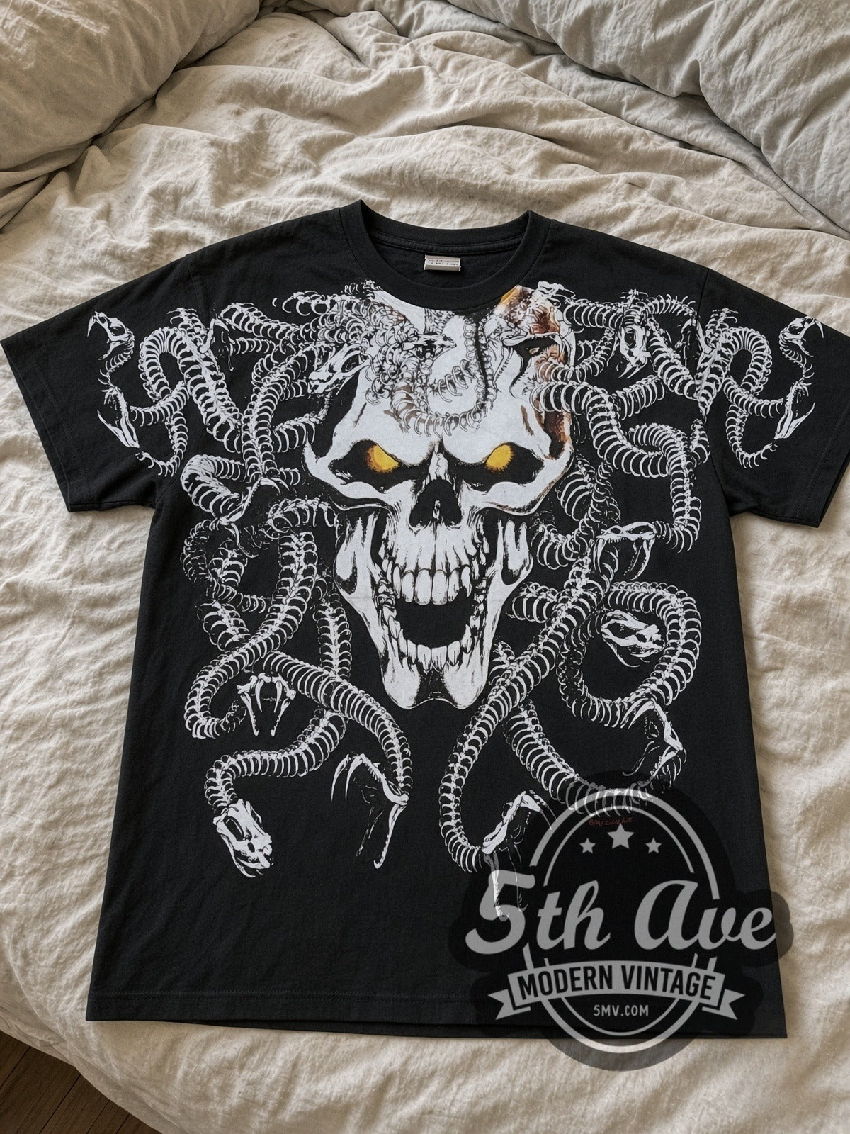 Medusa Snake Skull all-over-print vintage graphic tee laid flat