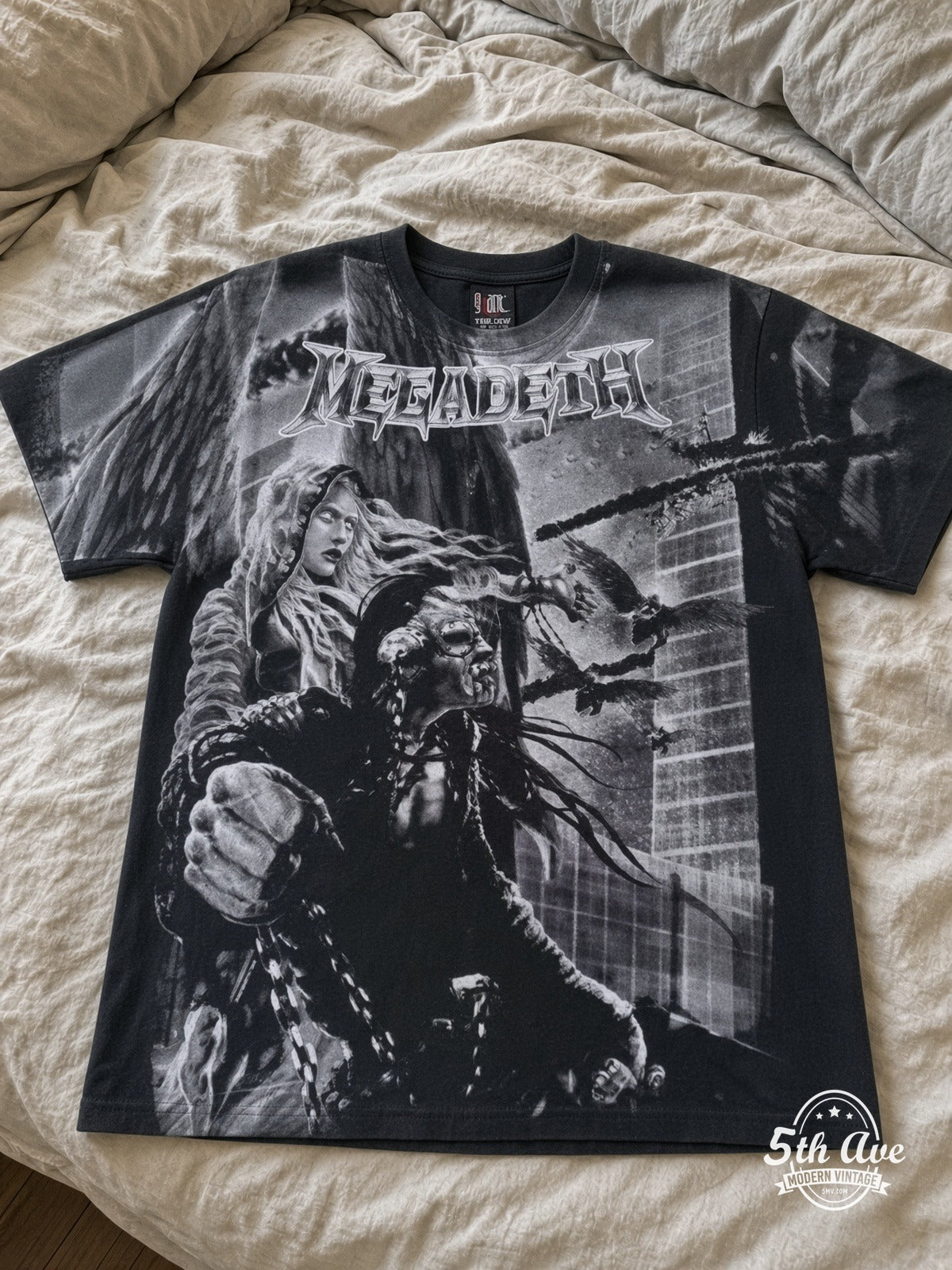 Megadeth Apocalyptic City AOP all over print vintage tee laid on bed