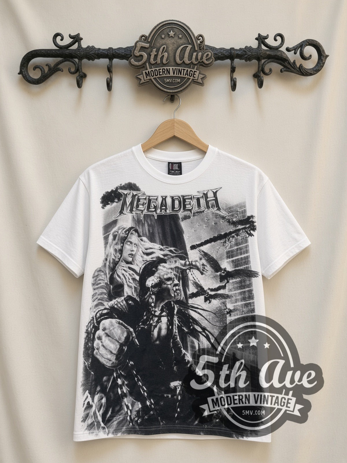 Megadeth Apocalyptic City all-over-print vintage band t-shirt in white, front view on a display rack