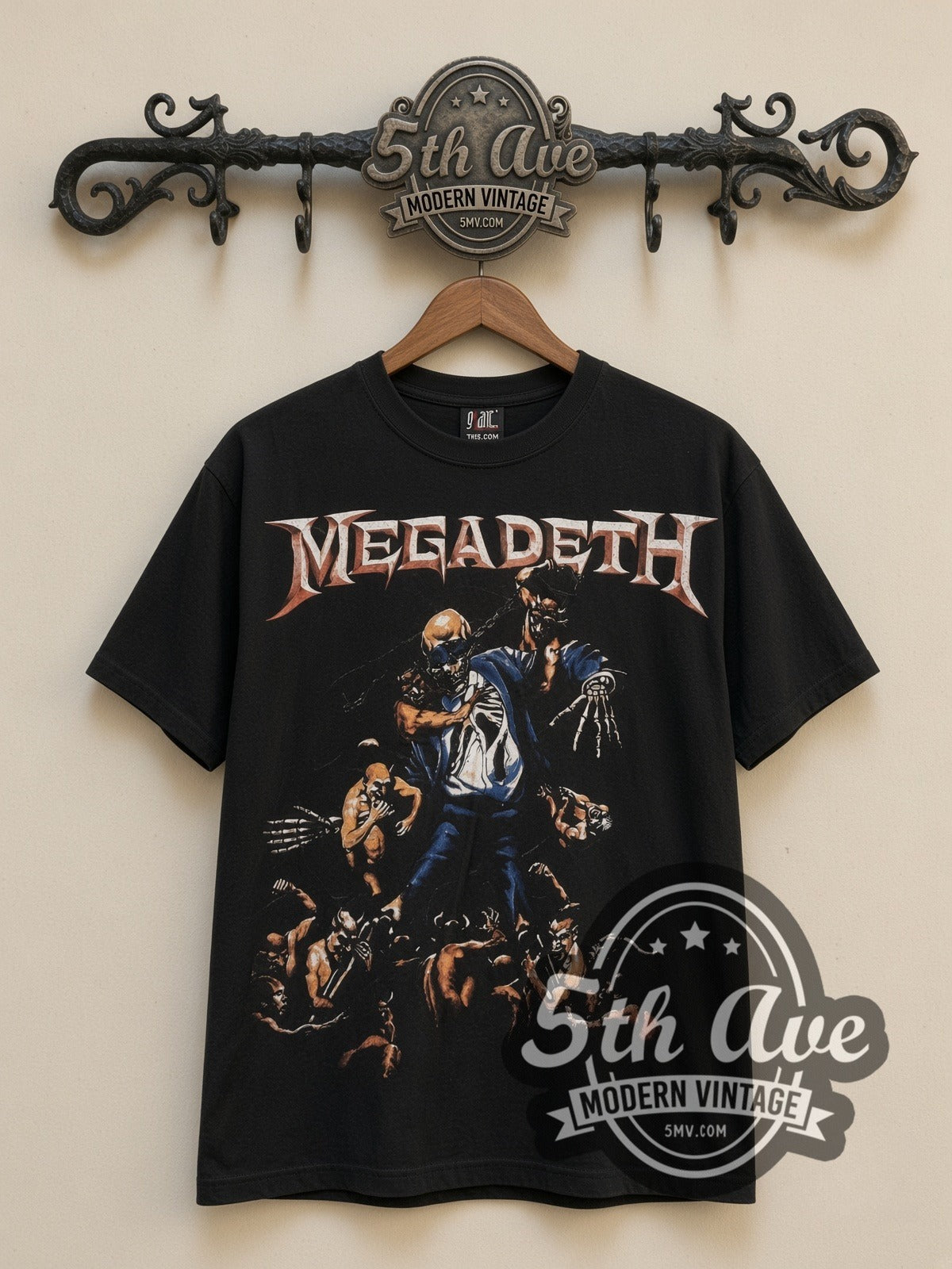 Megadeth Skeleton Apocalypse all-over-print vintage band t-shirt in black, front view on a display rack