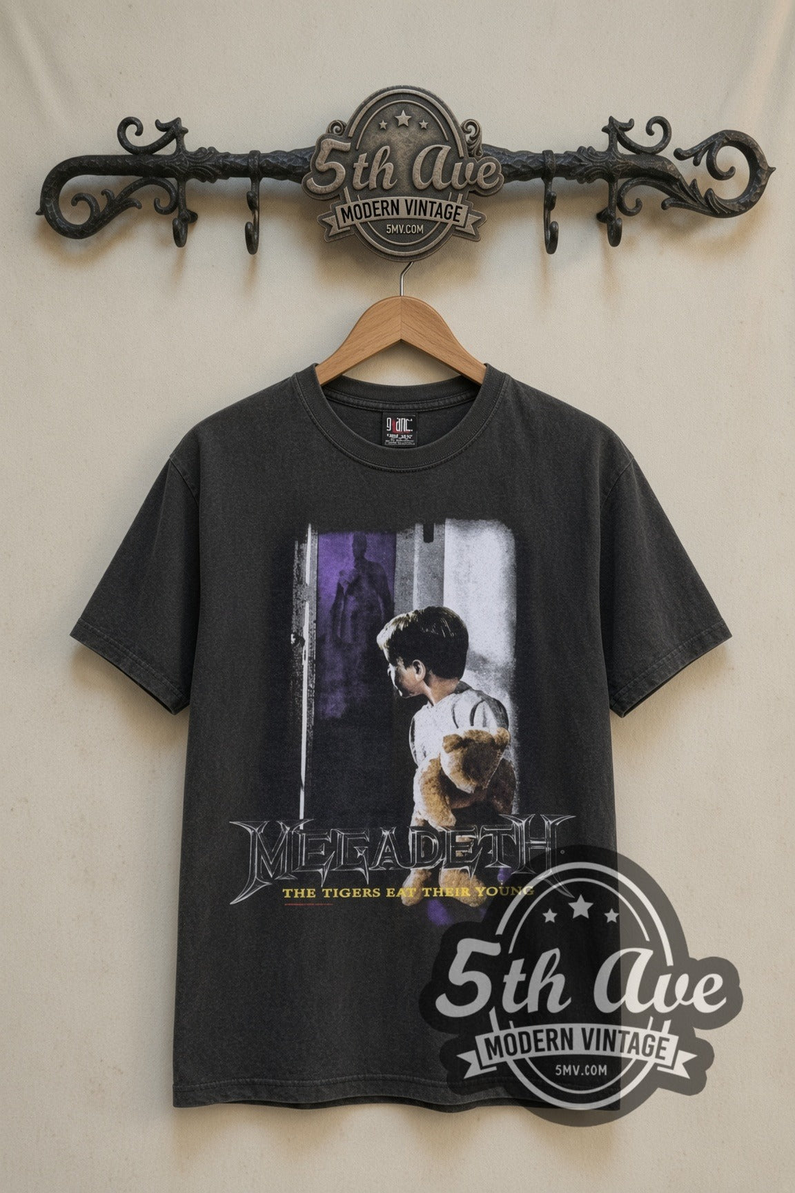 Megadeth Train of Consequences Globe vintage band t-shirt in black, front view on a display rack