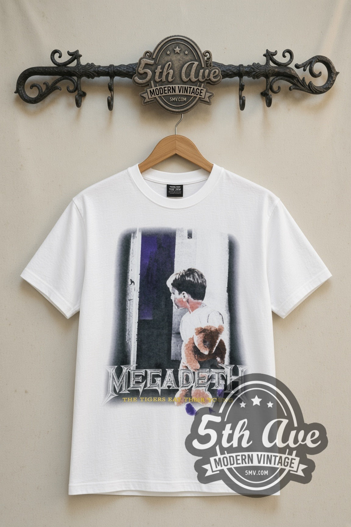 Megadeth Train of Consequences Globe vintage band t-shirt in white, front view on a display rack
