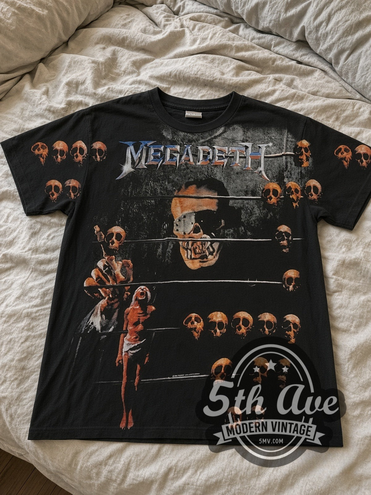 Megadeth Vic Prison Bars Skulls all-over-print vintage band tee laid flat