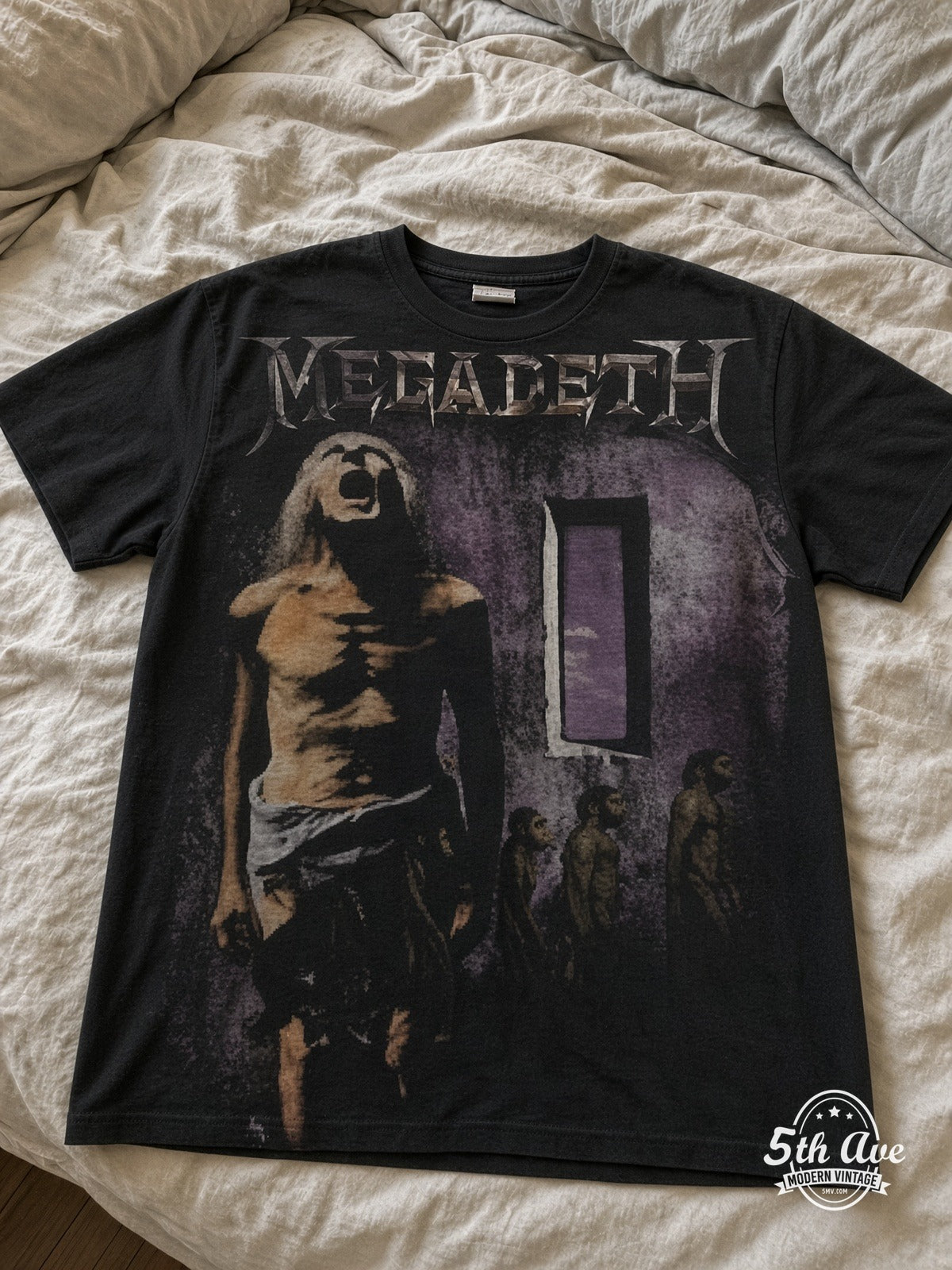 Megadeth Youthanasia all over print vintage tee laid on bed