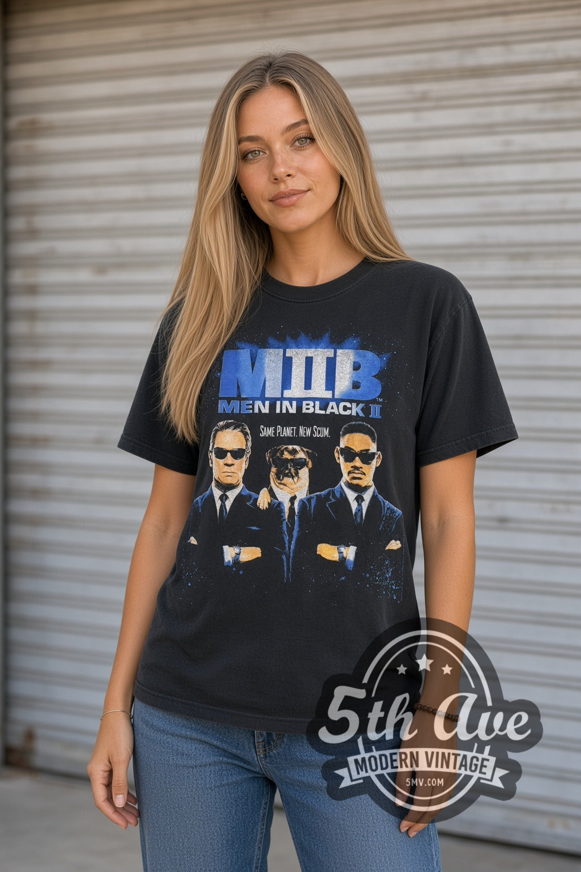 Woman wearing black Men in Black II Same Planet New Scum and Egg Chairs vintage movie tee