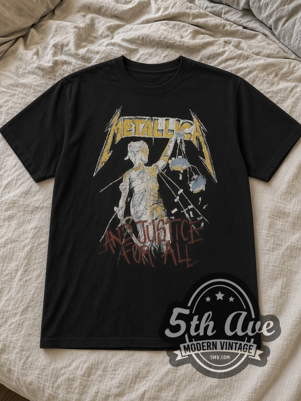 Black Metallica ...And Justice for All Tour 1989 Vintage Band T-Shirt laid flat on a linen bed