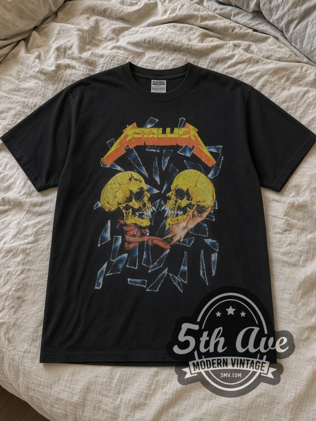 Black Metallica Sad But True Twin Skulls Glass Vintage Band T-Shirt laid flat on a linen bed