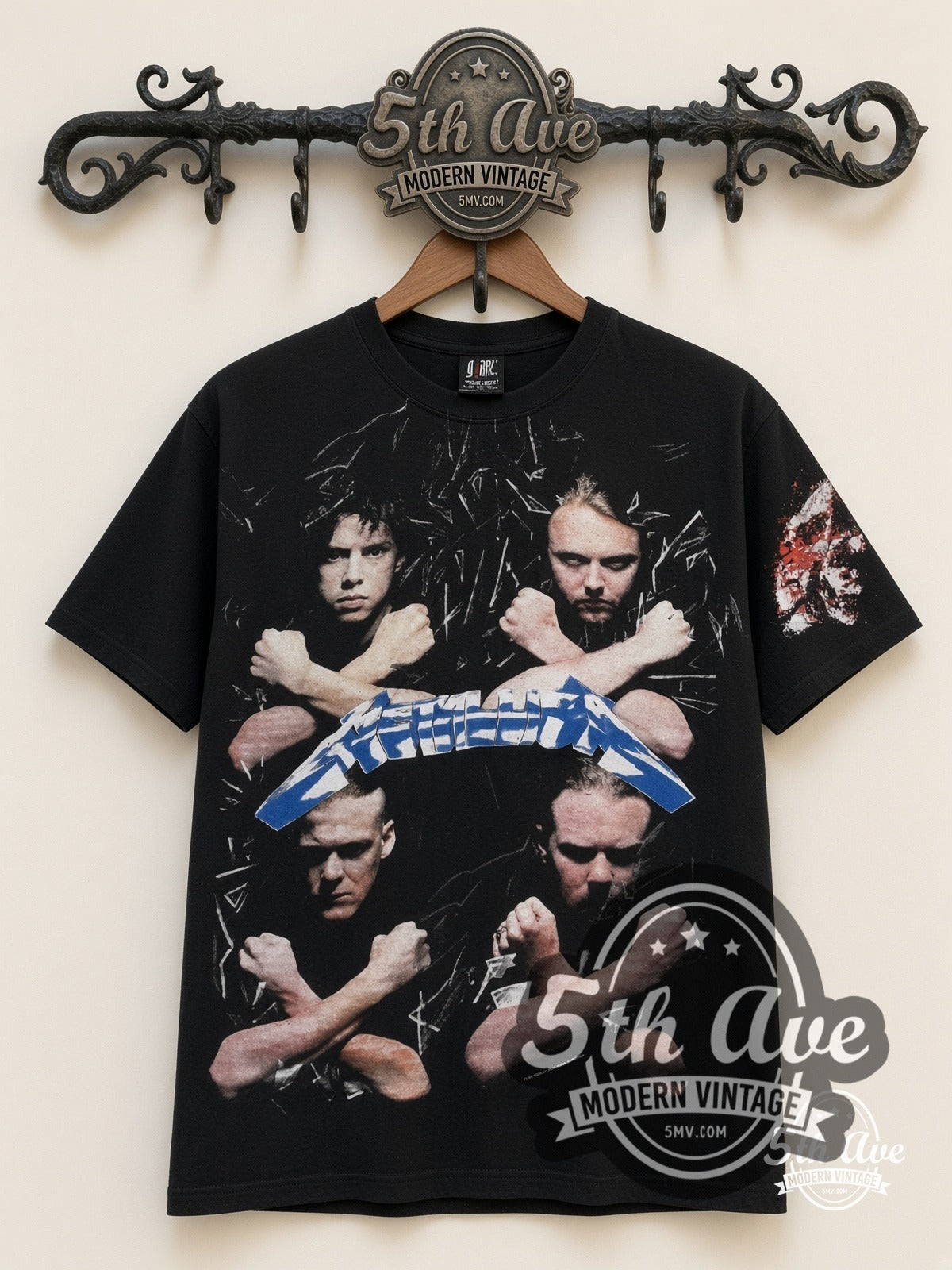 Metallica Band Portraits Skulls all-over-print vintage band t-shirt in black, front view on a display rack