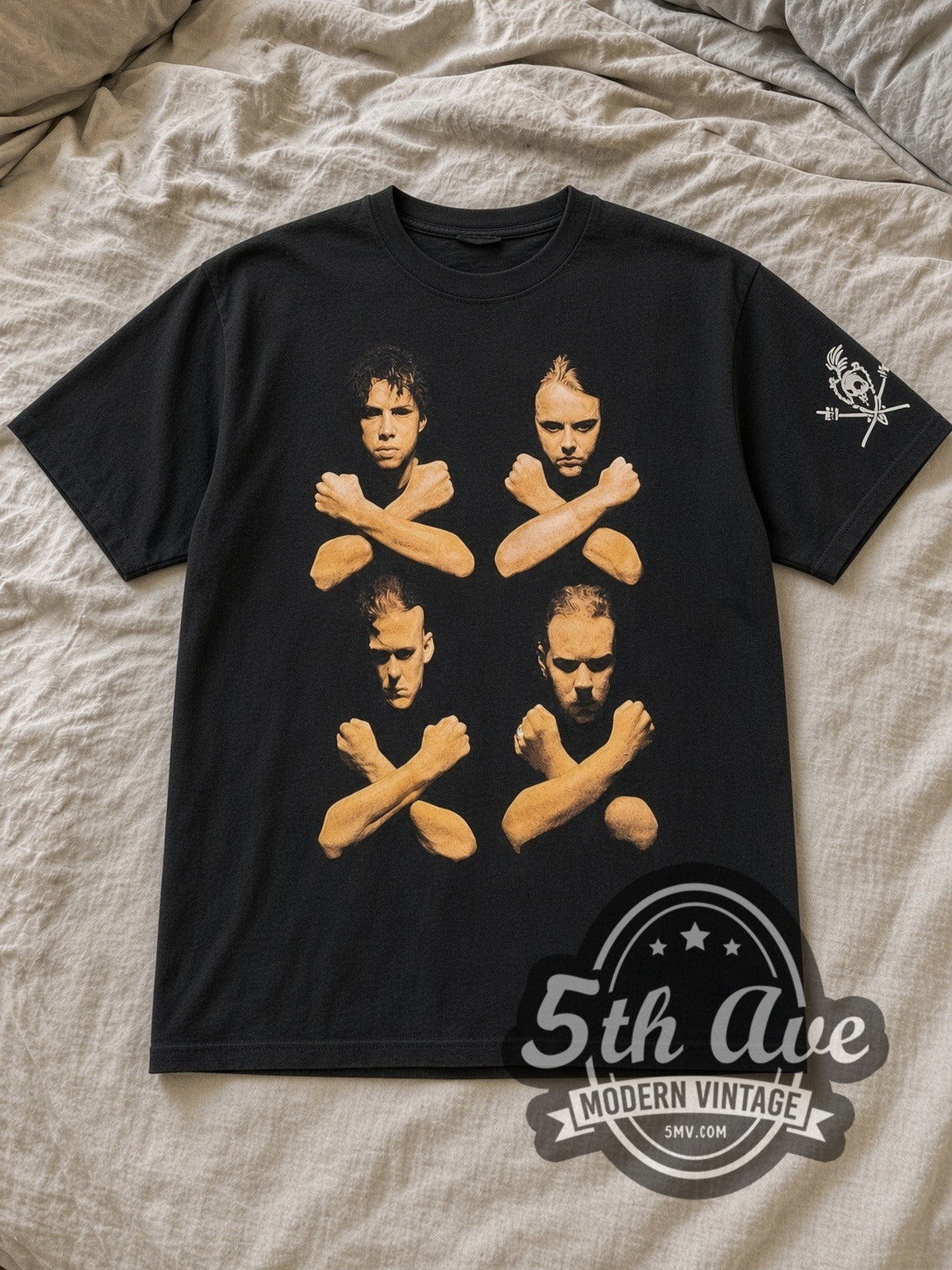 Black Metallica Birth School Four Members Crossed Arms Vintage Band T-Shirt laid flat on a linen bed
