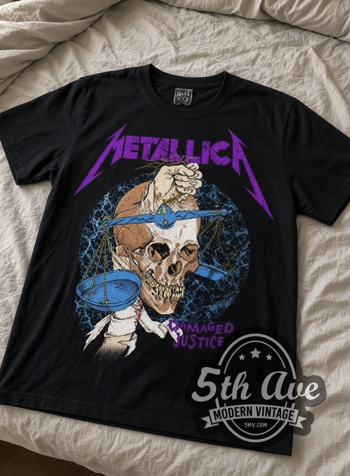 Metallica Damaged Justice Skull Scales vintage band tee laid flat