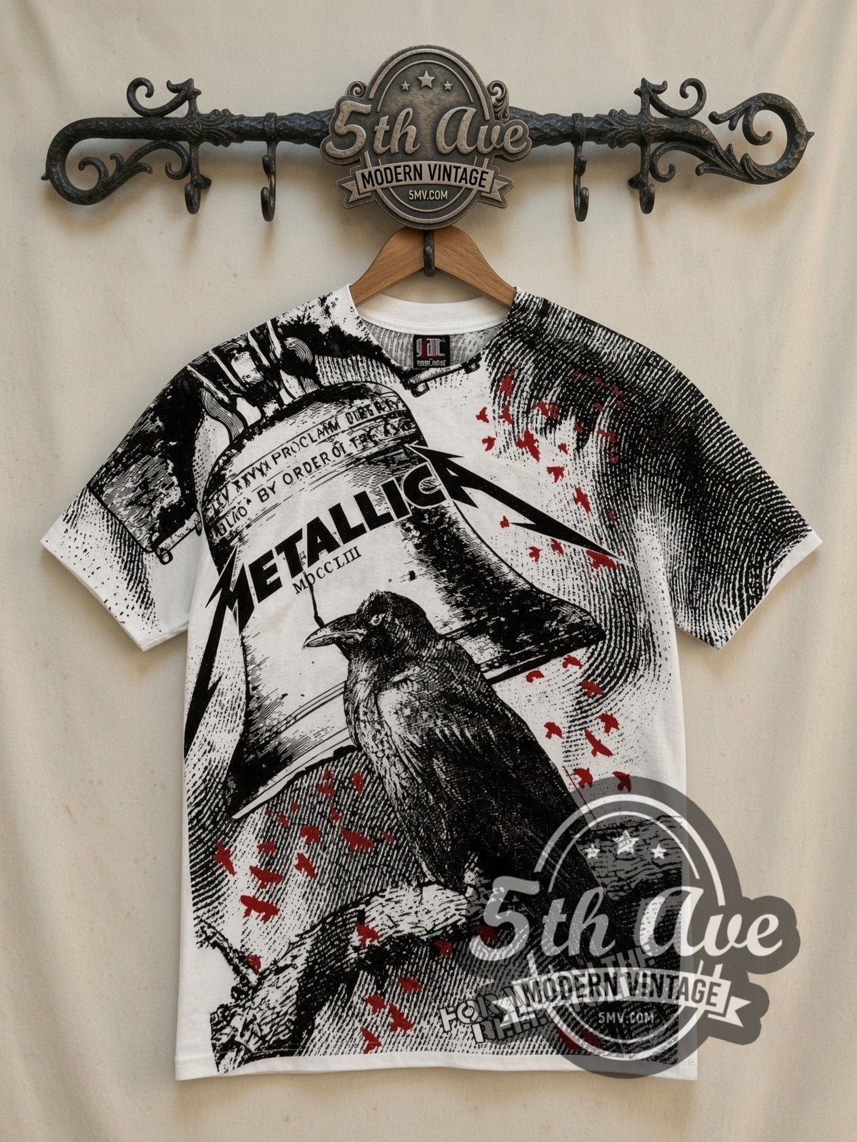 Metallica For Whom the Bell Tolls Crow all-over-print vintage band t-shirt in white, front view on a display rack