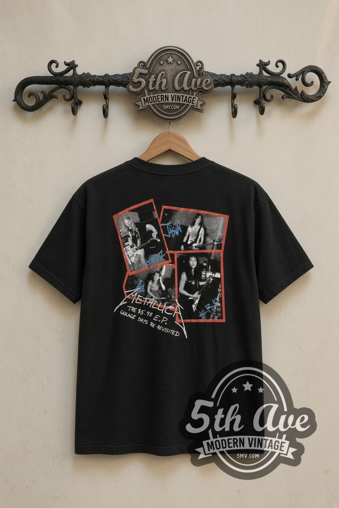 Metallica Garage Days Re-Revisited band t-shirt in black, back view on a display rack