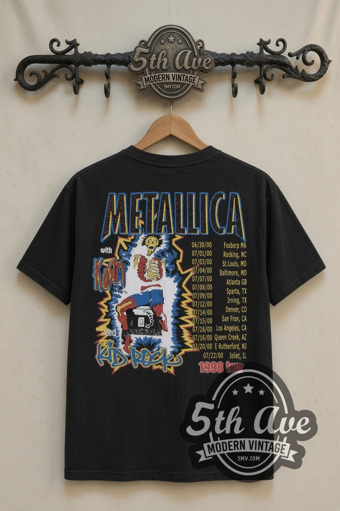 Metallica Sanitarium Skull 1998 Tour Dates band t-shirt in black, back view on a display rack