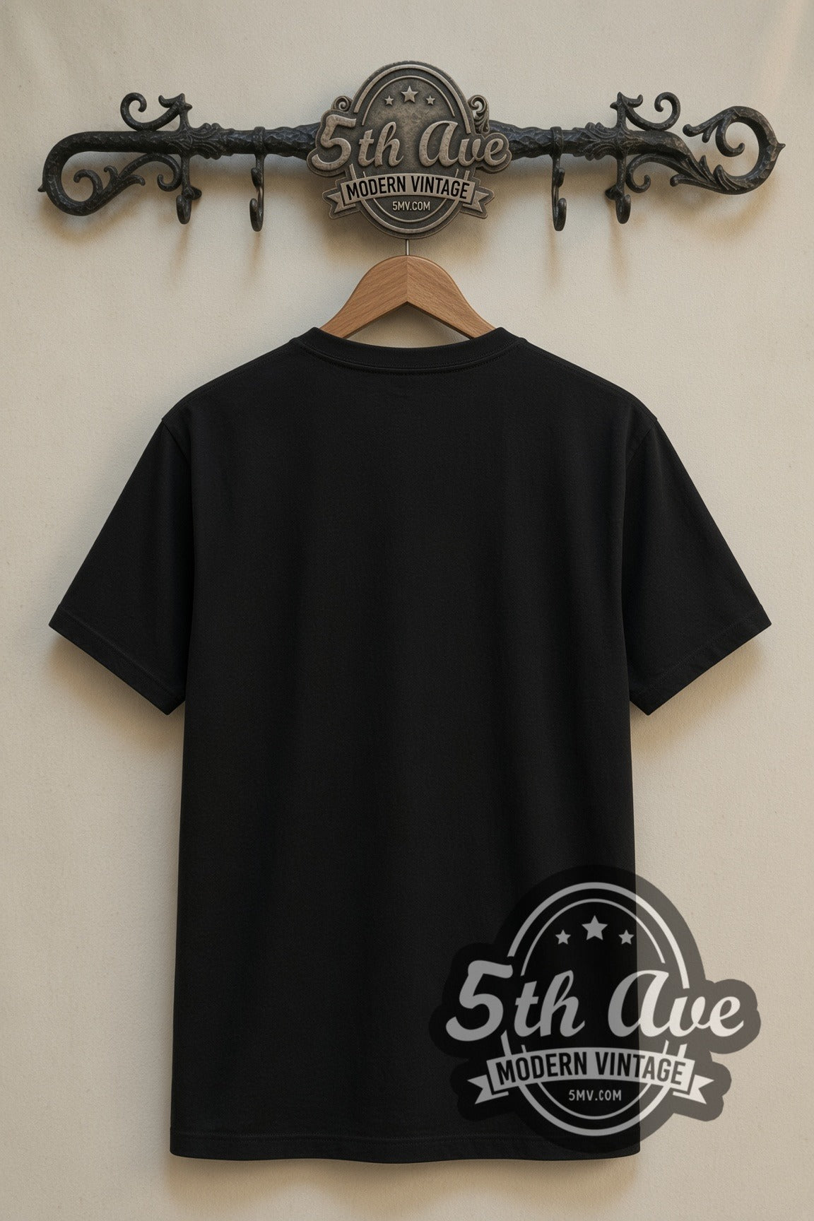 Plain black back of Metallica Skeleton Rising double stitched tee on rack