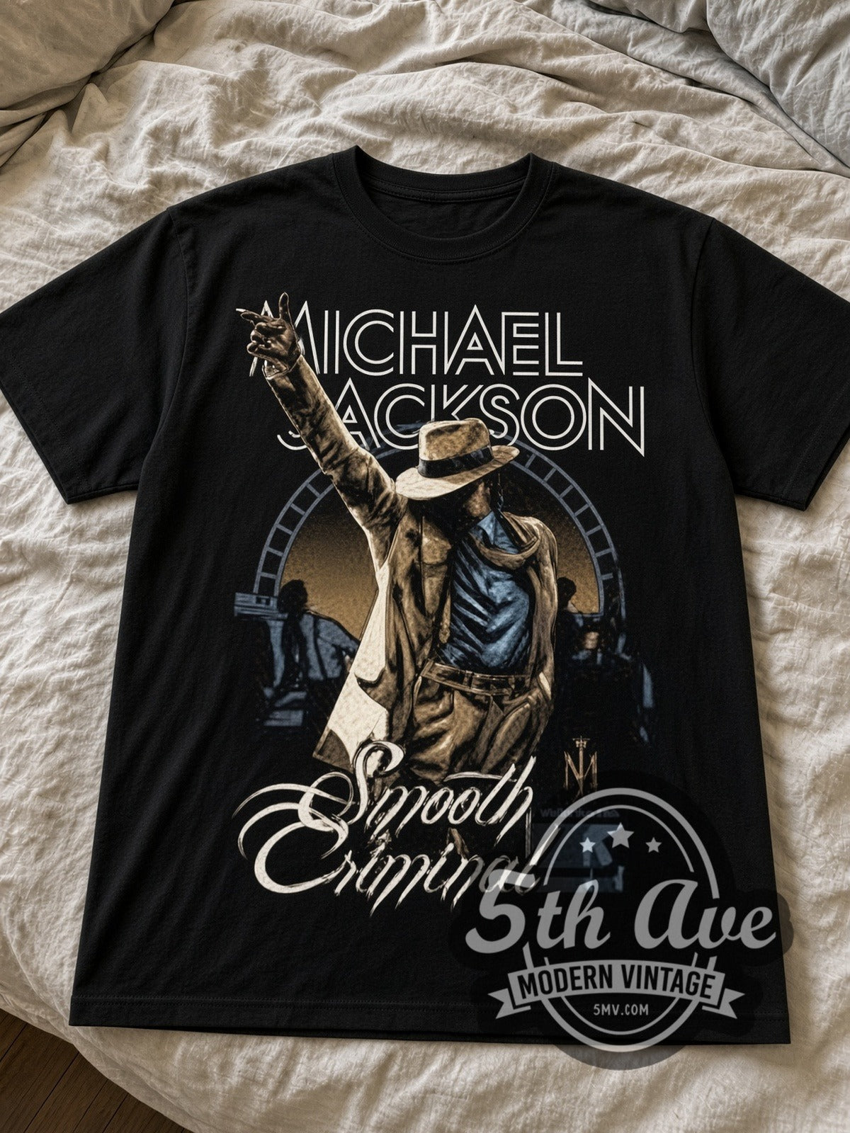 Michael Jackson Smooth Criminal black graphic tee laid flat on linen bed