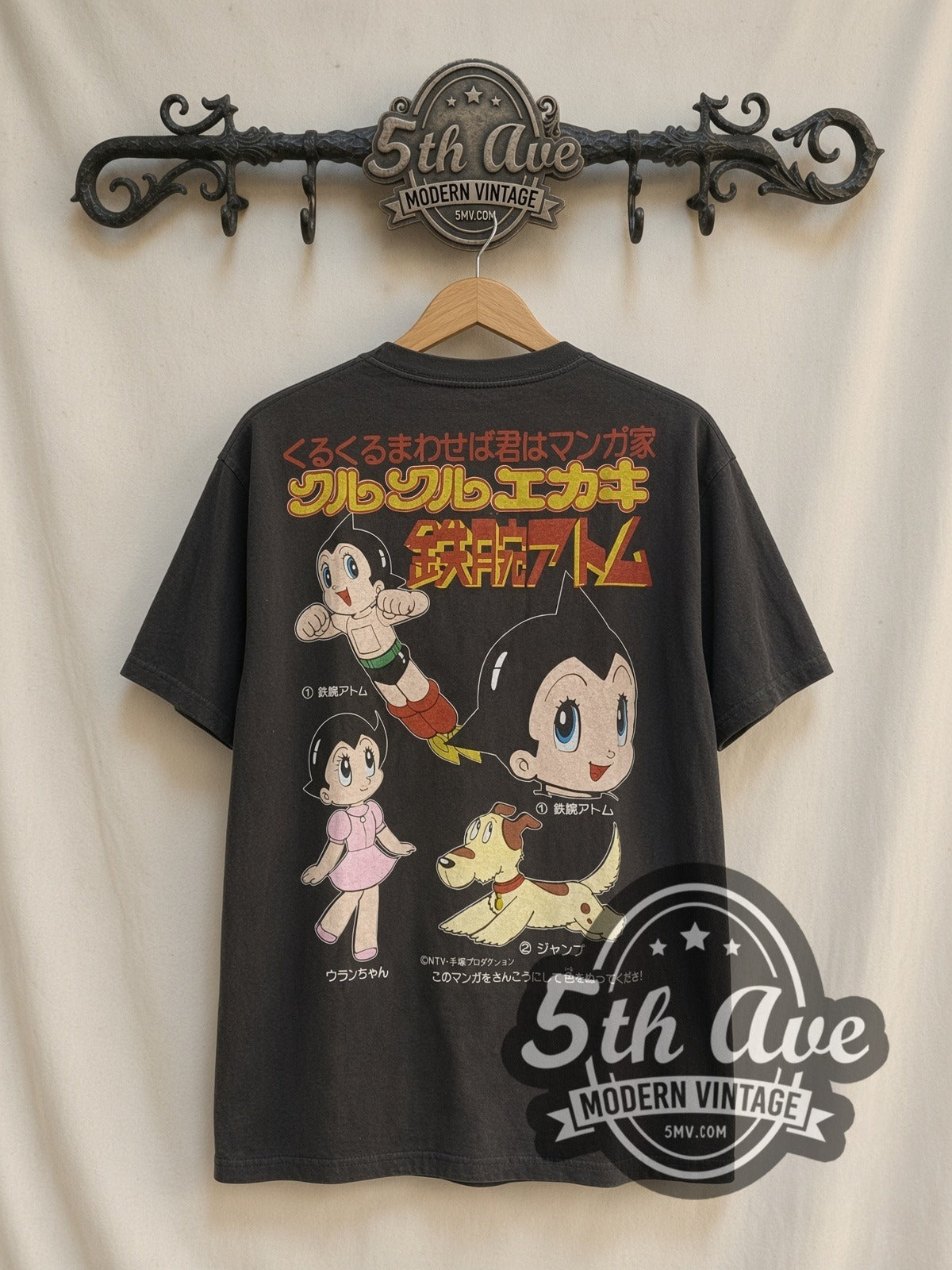Astro Boy Mighty Atom / Flying Portrait vintage cartoon t-shirt, back view on a display rack
