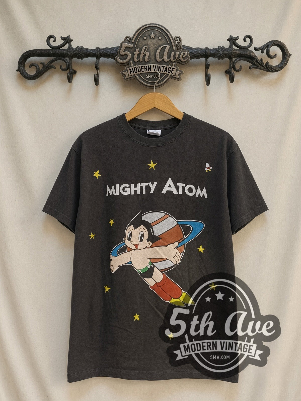 Astro Boy Mighty Atom / Flying Portrait vintage cartoon t-shirt, front view on a display rack