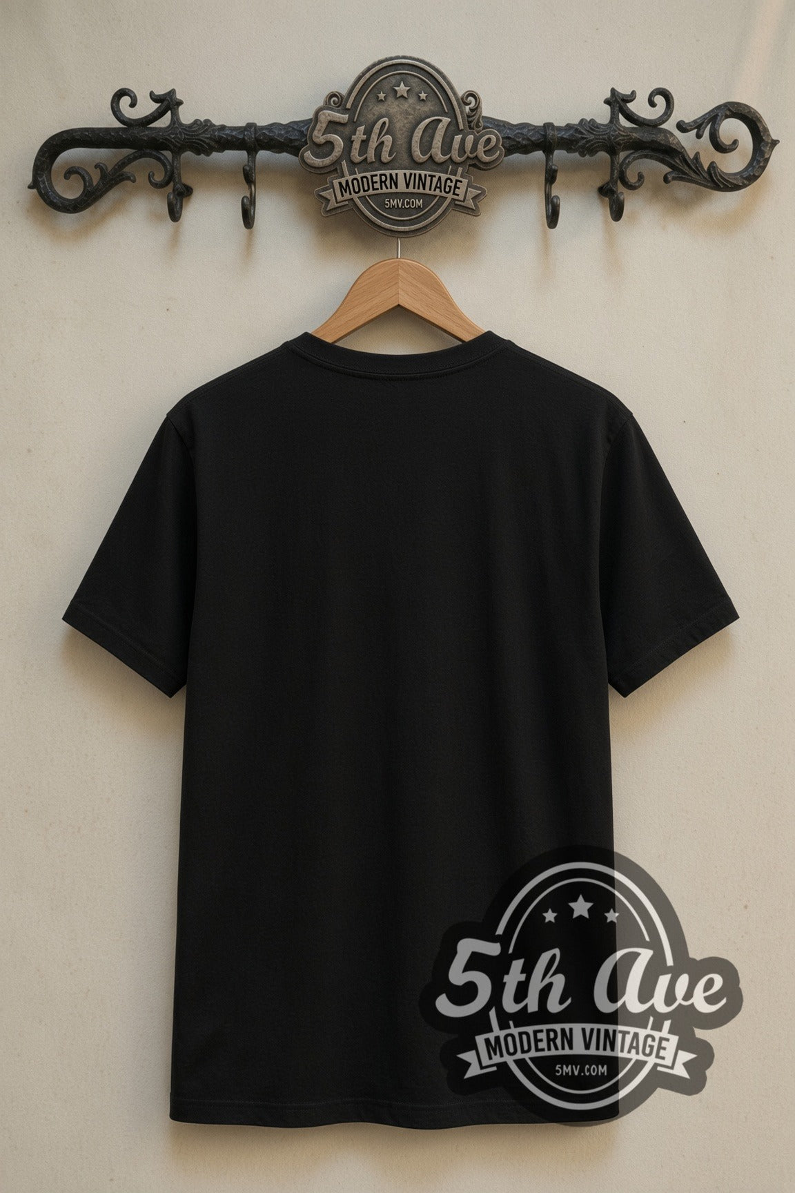 Plain black back of Mighty Morphin Power Rangers Megazord double stitched tee on rack