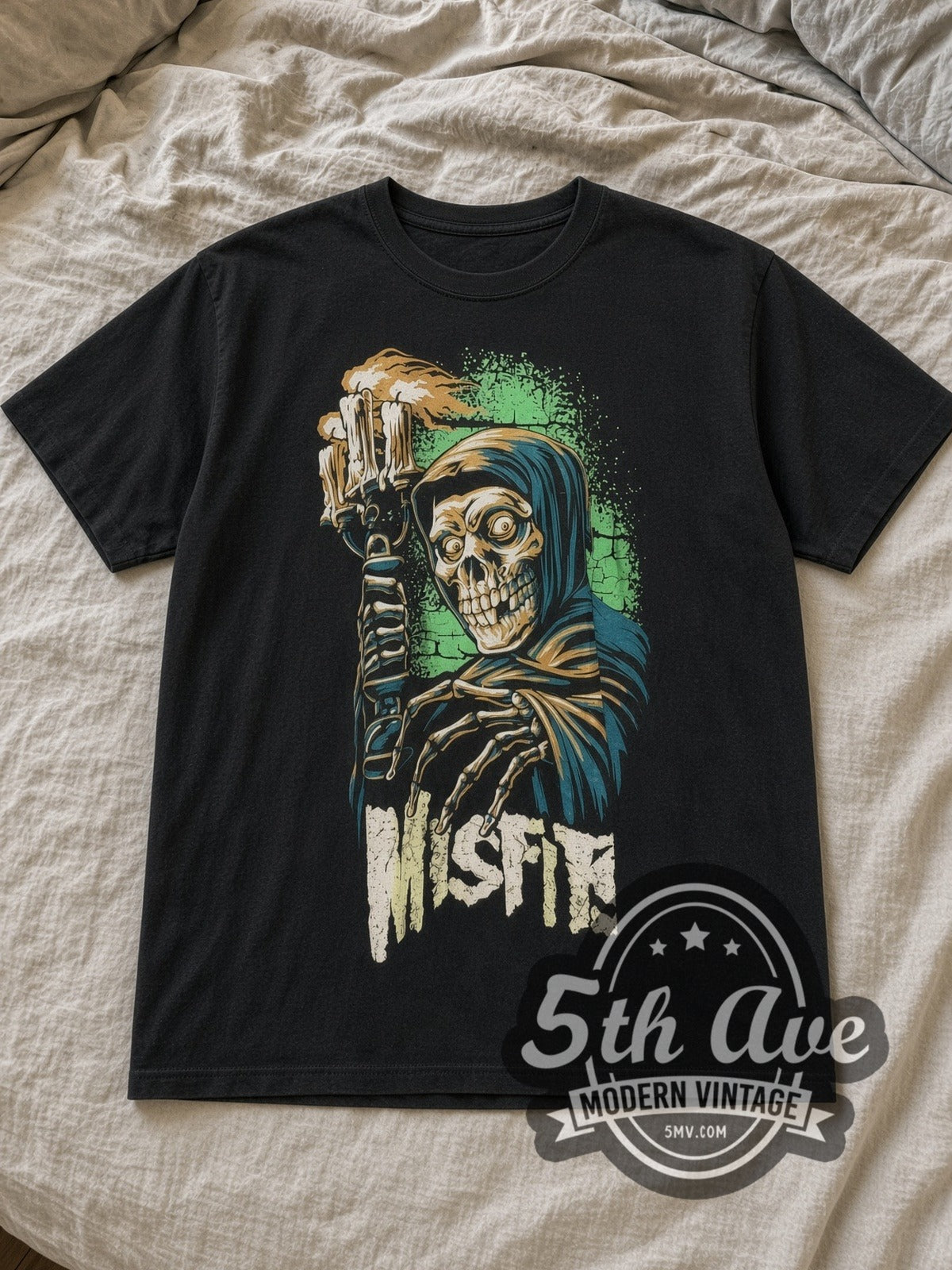 Black Misfits Crimson Ghost Holding Candelabra Vintage Band T-Shirt laid flat on a linen bed