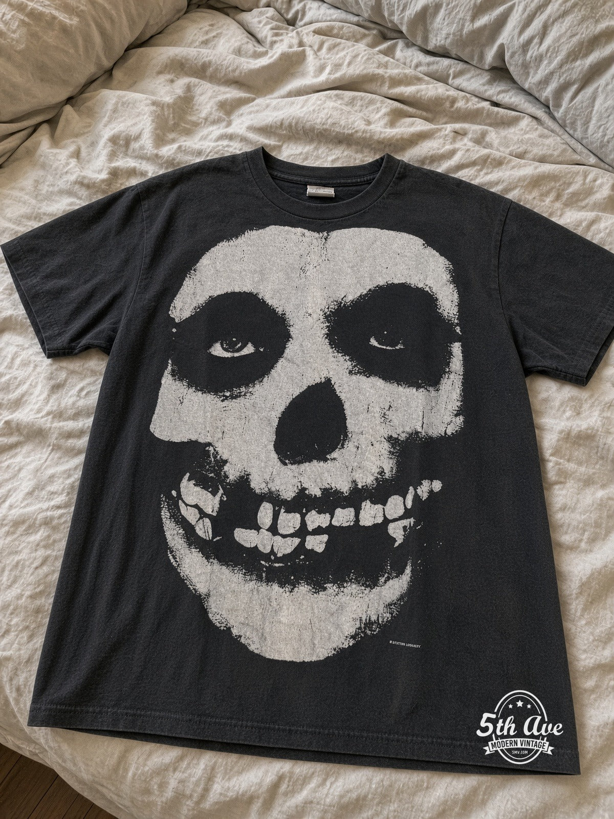 Misfits Crimson Ghost Skull vintage tee laid on bed